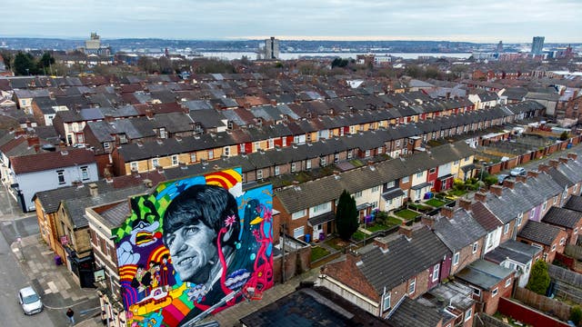 A mural of Ringo Starr, commissioned by Liverpool artist John Culshaw, is unveiled on the gable end of the Empress Pub on Admiral Street in Toxteth, Liverpool