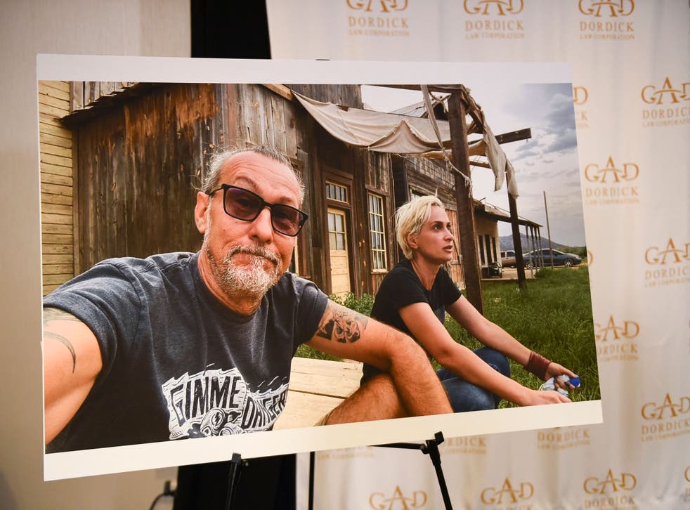 <p>A photo of Serge Svetnoy and Halyna Hutchins is displayed after a press conference with attorney Gary Dordick (not pictured) and Serge Svetnoy, chief lighting technician for the film Rust, about a lawsuit filed after the fatal shooting on the film Rust during a press conference on November 10, 2021 in Los Angeles, California</p>