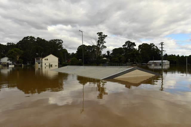 Houses inundated with floodwaters from an overflowing Hawkesbury River are pictured in the Windsor suburb of Sydney