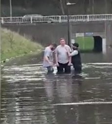 Man baptised in floodwater at roundabout in ceremony dubbed ‘meant to be’