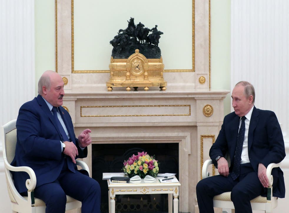 <p>Russian President Vladimir Putin meets with his Belarus' counterpart Alexander Lukashenko at the Kremlin in Moscow on 11 March 2022.</p>
