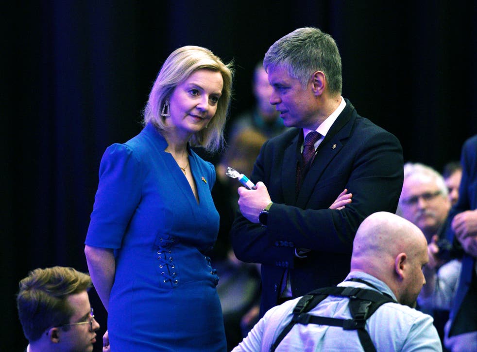 Foriegn Secretary Liz Truss talks with the Ukrainian Ambassador to the UK, Vadym Prystaiko following her speech (Peter Byrne/PA)