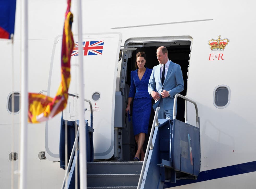William and Kate were welcomed by a guard of honour when they arrived at Philip S. W Goldson International Airport, Belize City (Toby Melville/PA)