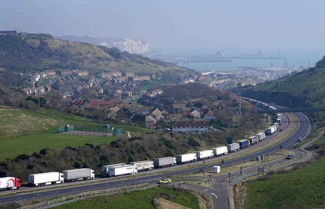 A view of lorries queued on the A20 near Dover in Kent as freight delays continue at the Port of Dover where P&O ferry services remain suspended after the company sacked 800 workers without notice last week