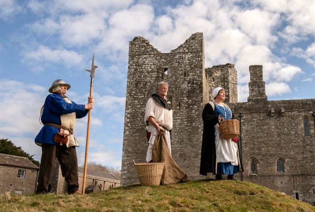 Re-enactors in the grounds of   Bolton Castle near to Leyburn in North Yorkshire, watch as re-enactors bring alive the story of the Battle of Towton, which took place on March 29th, 1461 at a small village near to York called Towton