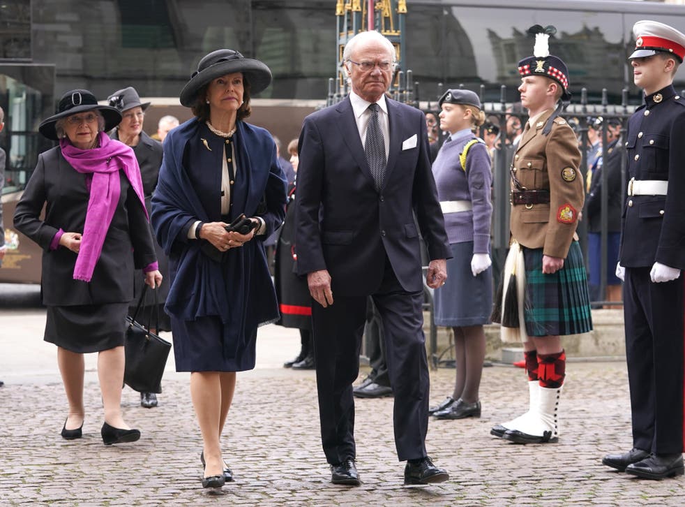 Queen Silvia and Carl XVI Gustaf, King of Sweden, arrive at the service (Kirsty O’Connor/PA)
