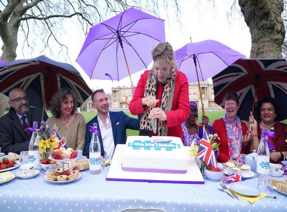 The former Bake Off judge was in charge of cutting the cake (Jonathan Brady/PA)