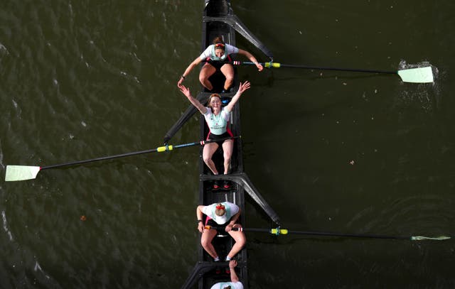 Cambridge women’s team celebrate after winning the 76th Women’s Boat Race on the River Thames in London