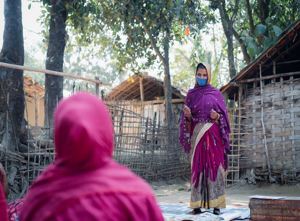 <p>Hason Ara leads a discussion with the group of women farmers she formed, reminding them of the importance of saving, investing and not giving up</p>