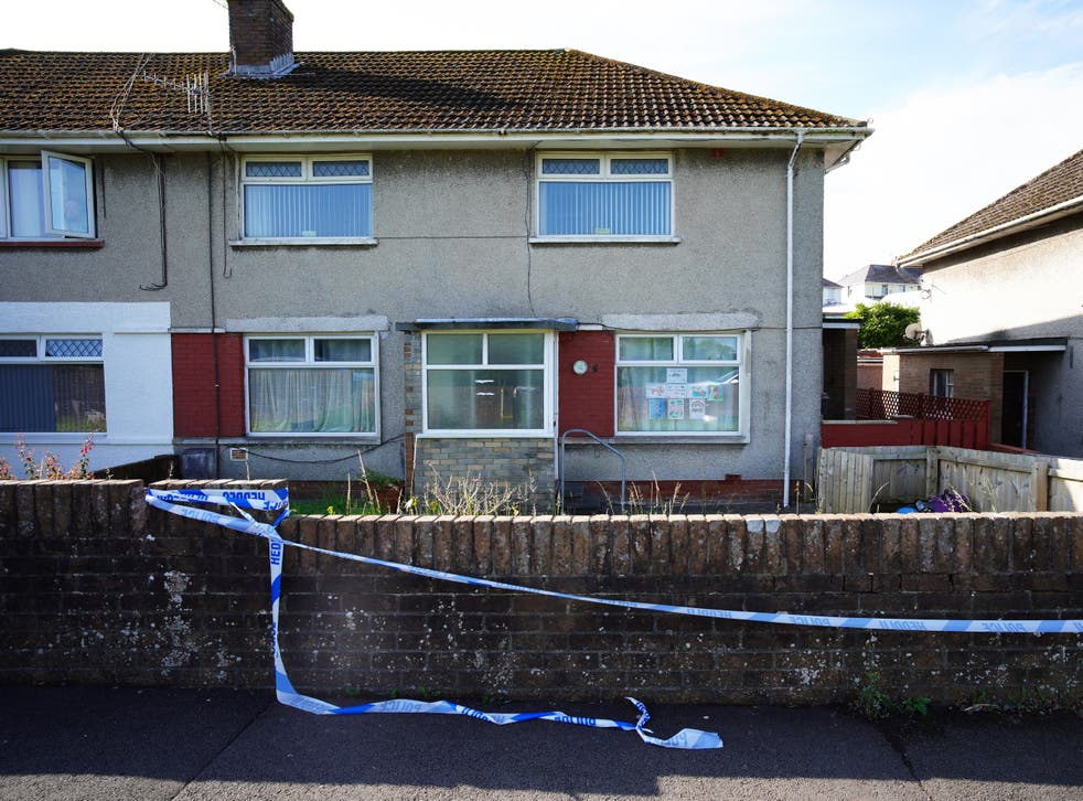 <p>Police tape at a property in the Sarn area of Bridgend, near where five-year-old Logan Mwangi was found dead in the River Ogmore</s>