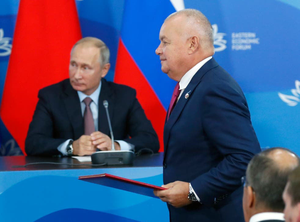 <p>Head of Russia's state news agency Rossiya Segodnya, Dmitry Kiselyov, and President Vladimir Putin</p>