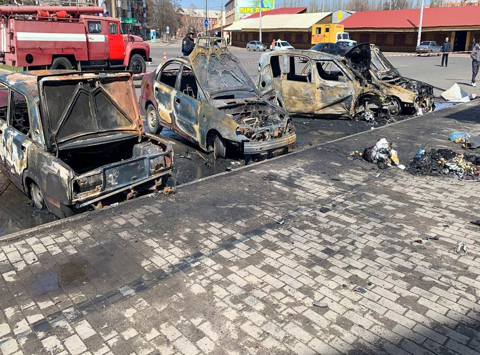 <p>Burnt-out cars after a rocket attack on a railway station in Kramatorsk</s>
