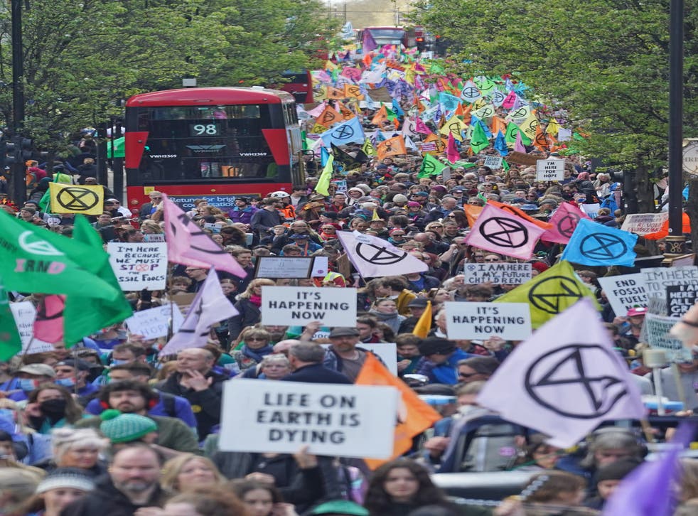 Hundreds of protesters marched from Hyde Park into the city’s famous shopping district to demand an end to fossil fuel investment (Stefan Rousseau/PA)
