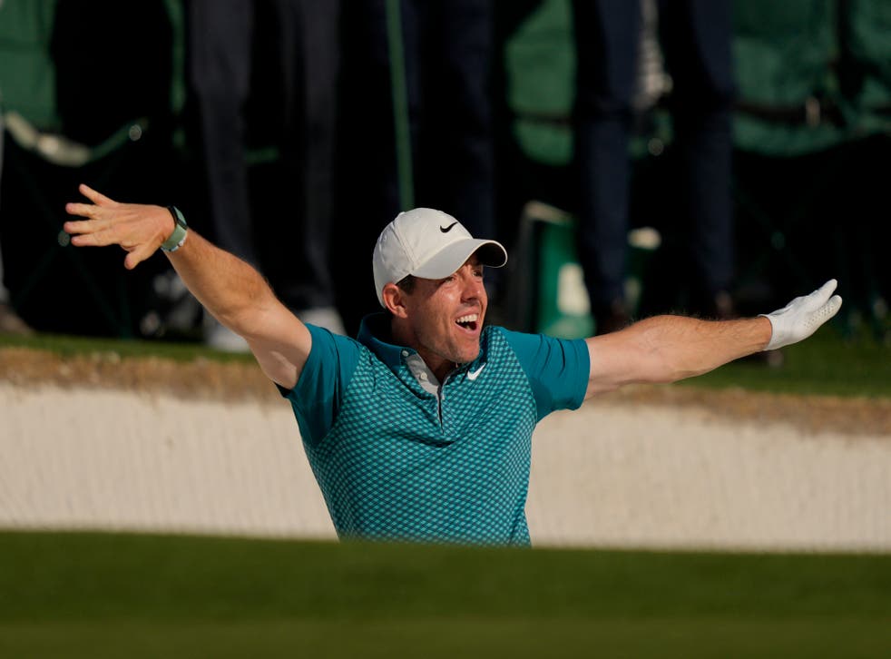 Rory McIlroy reacts after holing out from the bunker for a birdie on the final hole of the Masters (Matt Slocum/AP)