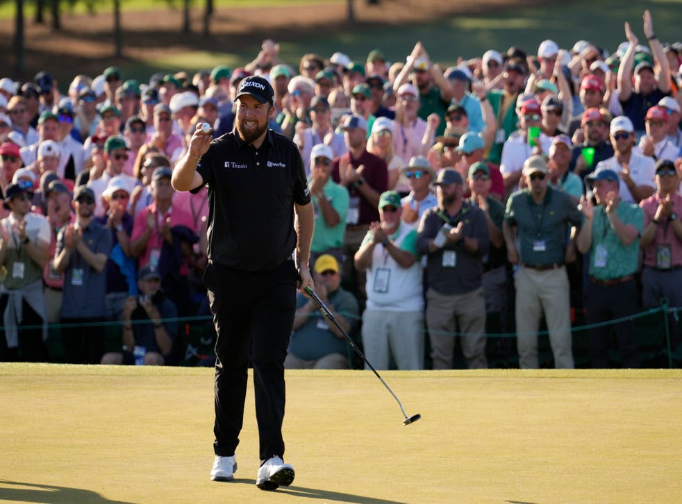 Shane Lowry holds up his ball after a birdie on the 18th during the final round of the Masters (Jae C. Hong/AP)