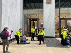 Activists enter Shell HQ and glue themselves to government buildings