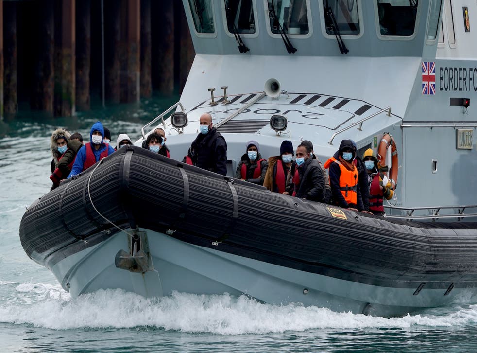 A group of people are brought in to Dover, Kent, onboard a Border Force vessel following a small boat incident in the Channel on Wednesday (Gareth Fuller/PA)