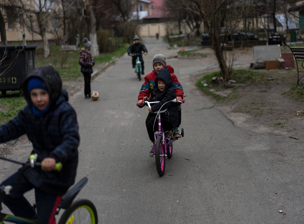 <p>Children playing in Bucha on the outskirts of Kyiv, one of many sites of suspected war crimes by the Russian army </s>