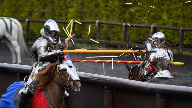 Riders dressed as knights take part in the International Jousting Tournament, held at the Royal Armouries Museum in Leeds, northern England