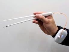 Electric chopstick invention makes food taste more salty