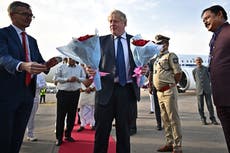 PM arrives in India as Tories try to delay Partygate probe
