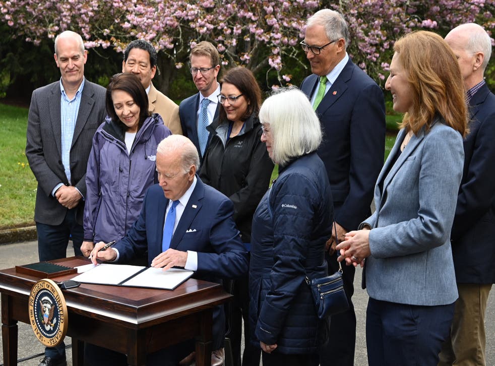 <p>Mr Biden signs executive order to protect nation’s forests during Earth Day event at Seward Park in Seattle, Washington</p>
