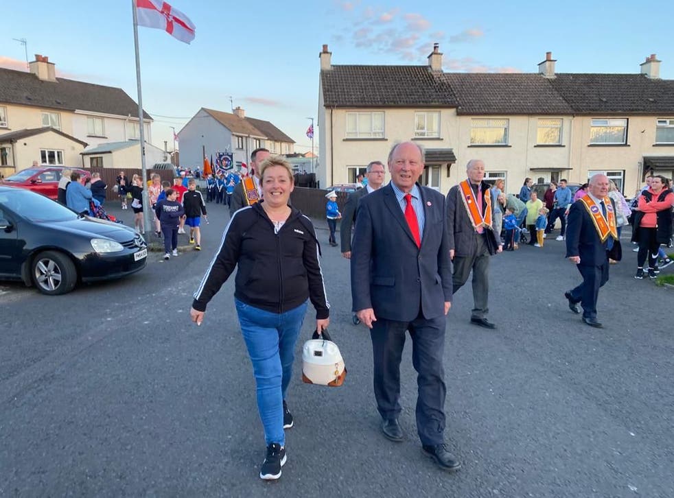 TUV leader Jim Allister (left) with his party’s Foyle candidate Elizabeth Neely at a parade ahead of the latest anti-protocol rally which took place in Newbuildings, Co Londonderry on Saturday evening, (TUV/PA)