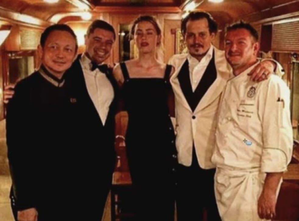 <p>A photo of Johnny Depp and Amber Heard during their honeymoon on the Orient Express from Bangkok to Singapore</p>