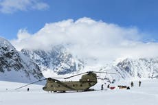 US Army Chinook helicopters help set up base camp on Denali