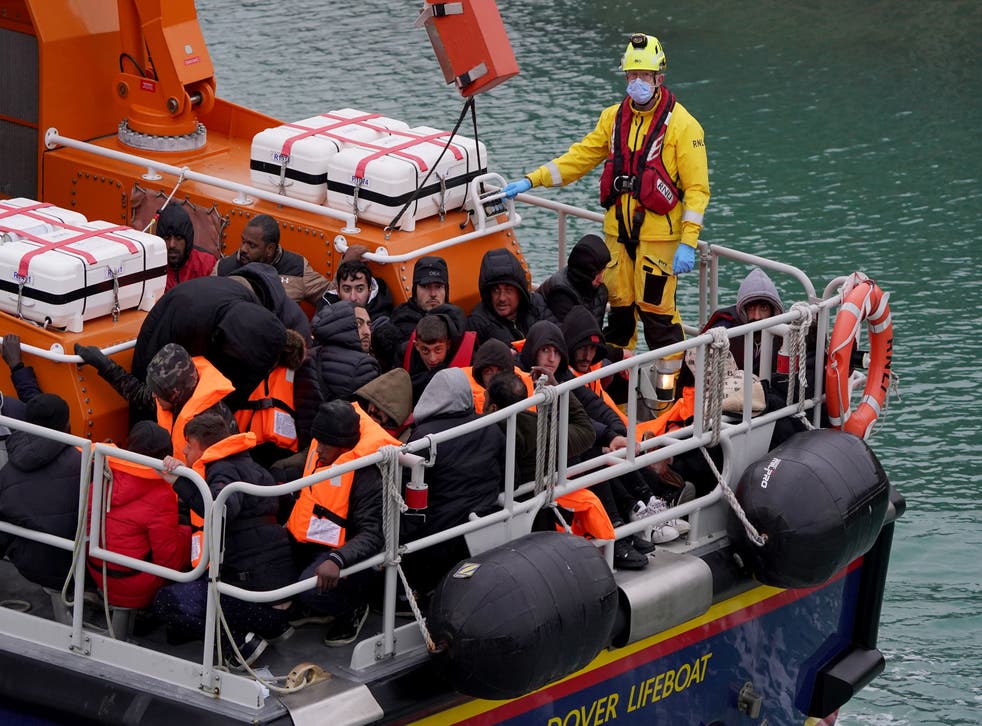 A group of people arrive into Dover on a lifeboat on Monday (Gareth Fuller/PA)