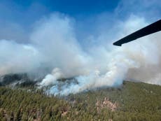 Wind-whipped fire forces more New Mexico residents to flee