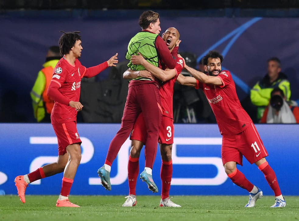 <p>Fabinho celebrates with teammates after scoring their team's first goal</p>