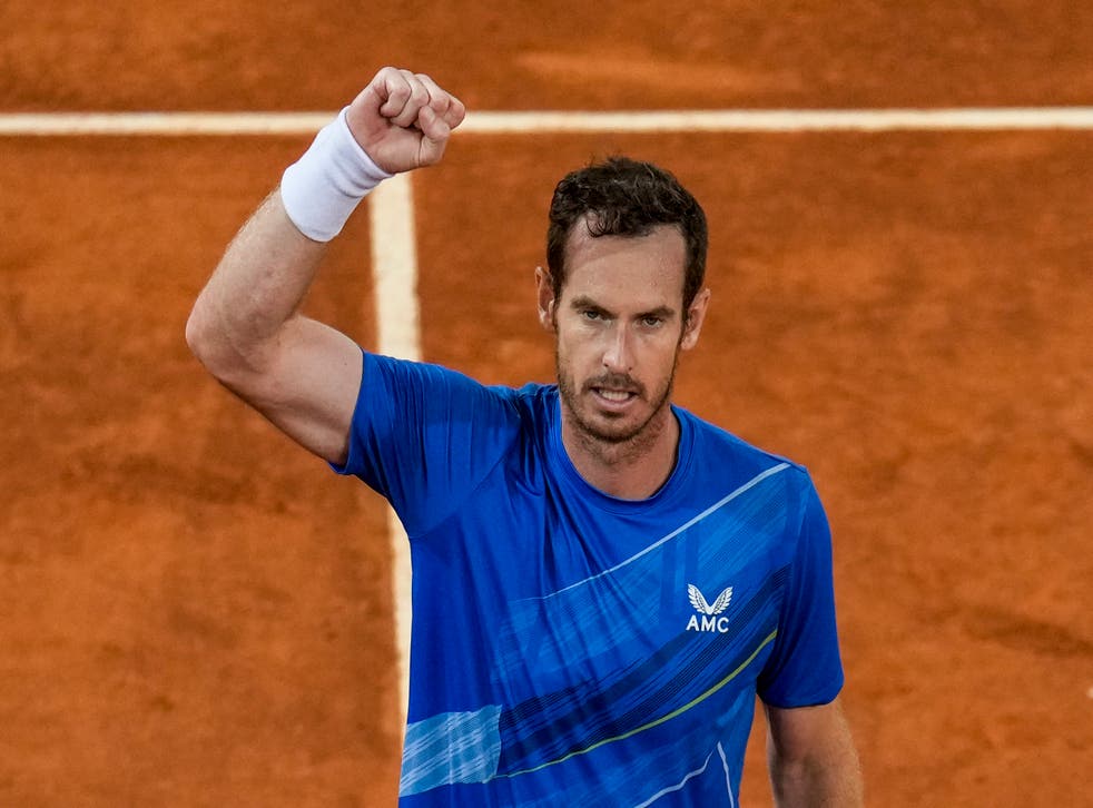 Andy Murray celebrates his victory over Dominic Thiem of Austria during their match at the Mutua Madrid Open tennis tournament in Madrid (Manu Fernandez / AP)