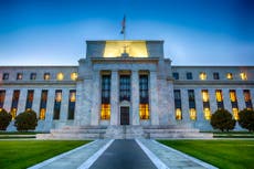 Federal Reserve raises interest rates by half point to fight inflation