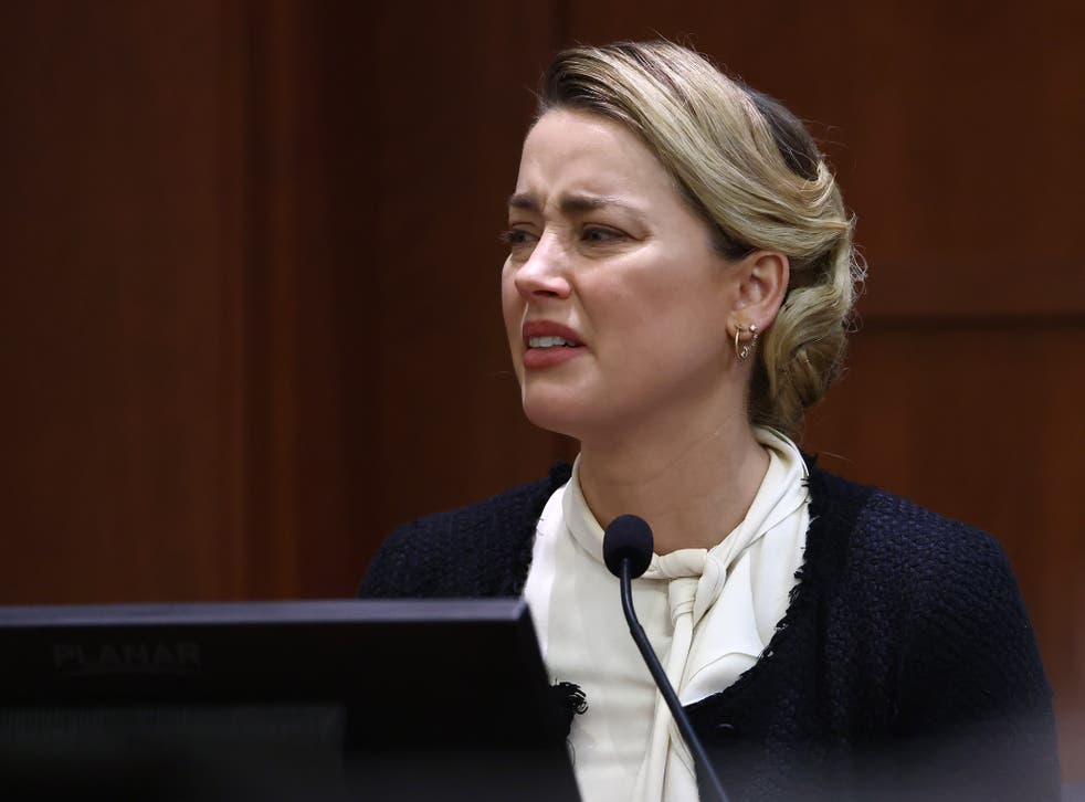 <p>US actress Amber Heard reacts on the stand during the 50 million US dollar Depp vs Heard defamation trial at the Fairfax County Circuit Court in Fairfax, Virginia, USA, 05 May 2022</p>