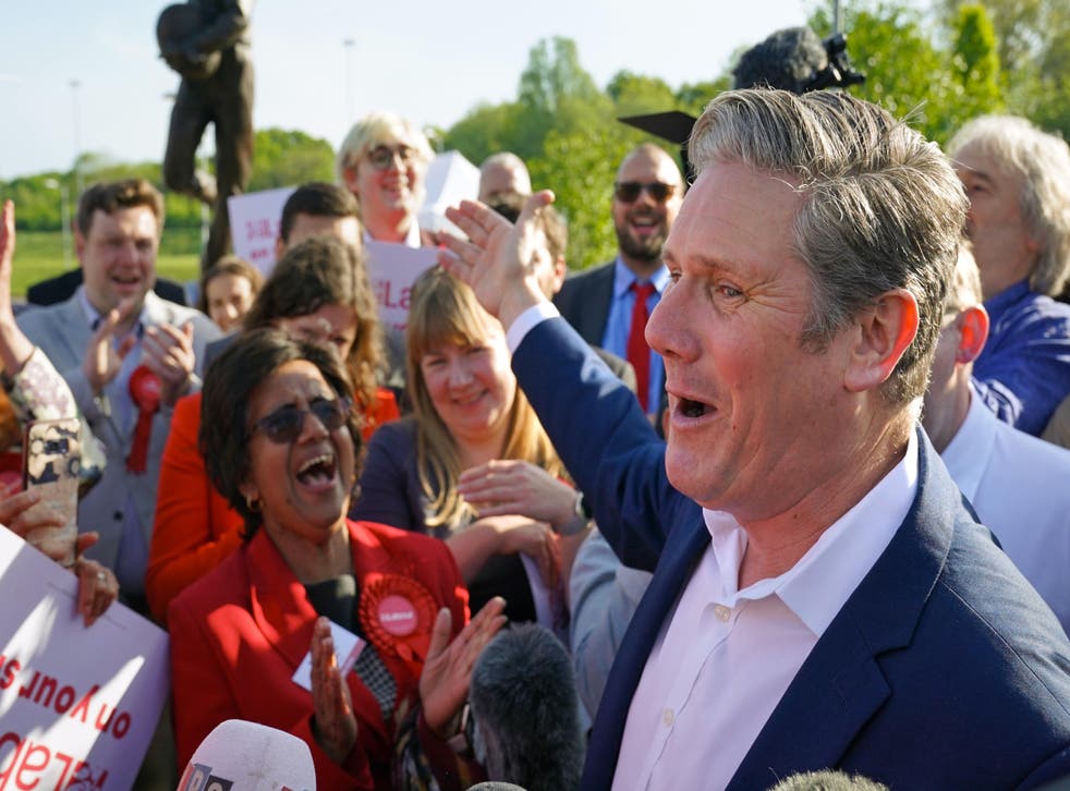 Sir Keir Starmer celebrates with Labour supporters in Barnet (Jonathan Brady / PA)