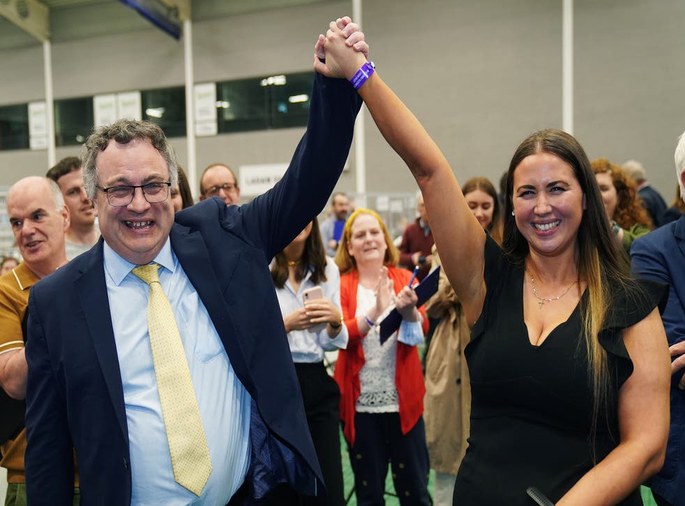 Alliance Party’s Sorcha Eastwood celebrates with MP Stephen Farry (Niall Carson/PA)
