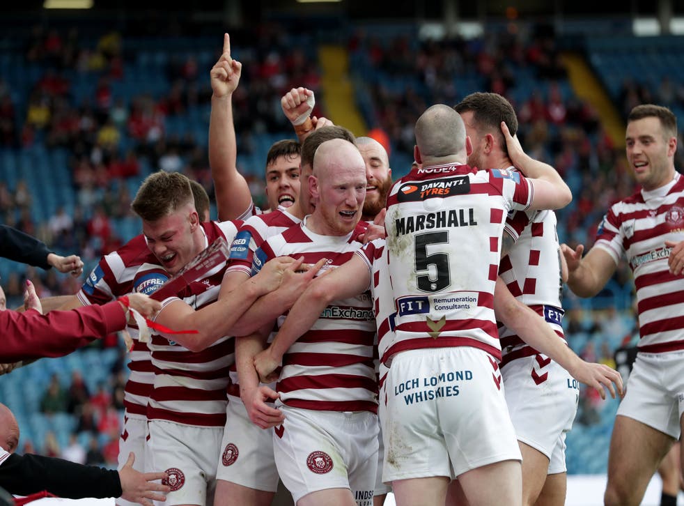 Liam Farrell (senter) crossed over in Wigan’s victory (Richard Sellers/PA)