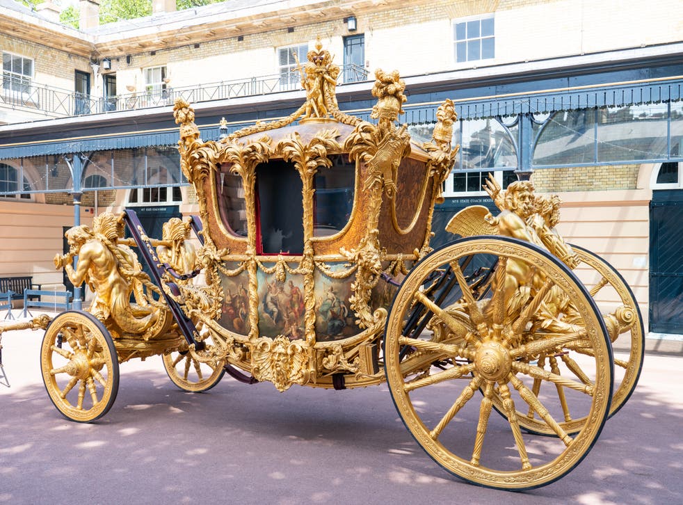 General view of the Gold State Coach, at the Royal Mews, Buckingham Palace, Londo (Dominic Lipinski/PA)