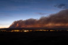 New Mexico wildfire advances in Rocky Mountains foothills