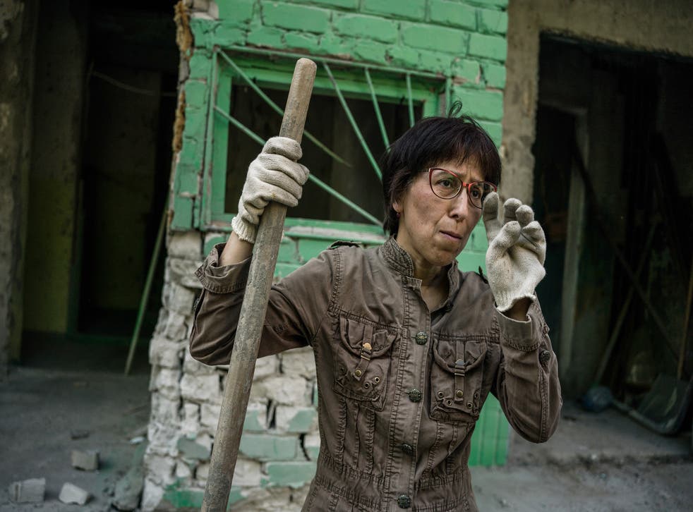 <p>Marina Smelianskaia is a volunteer who has helped clean up areas destroyed in Russian airstrikes</s>
