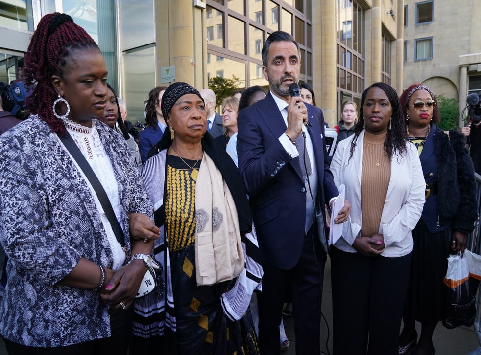 <p>Sheku’s mother Aminata Bayoh (second left) with Sheku’s sisters and lawyer Aamer Anwar (sentrum) at the start of a public inquiry into the death of Sheku Bayoh (Andrew Milligan/PA)<blp>