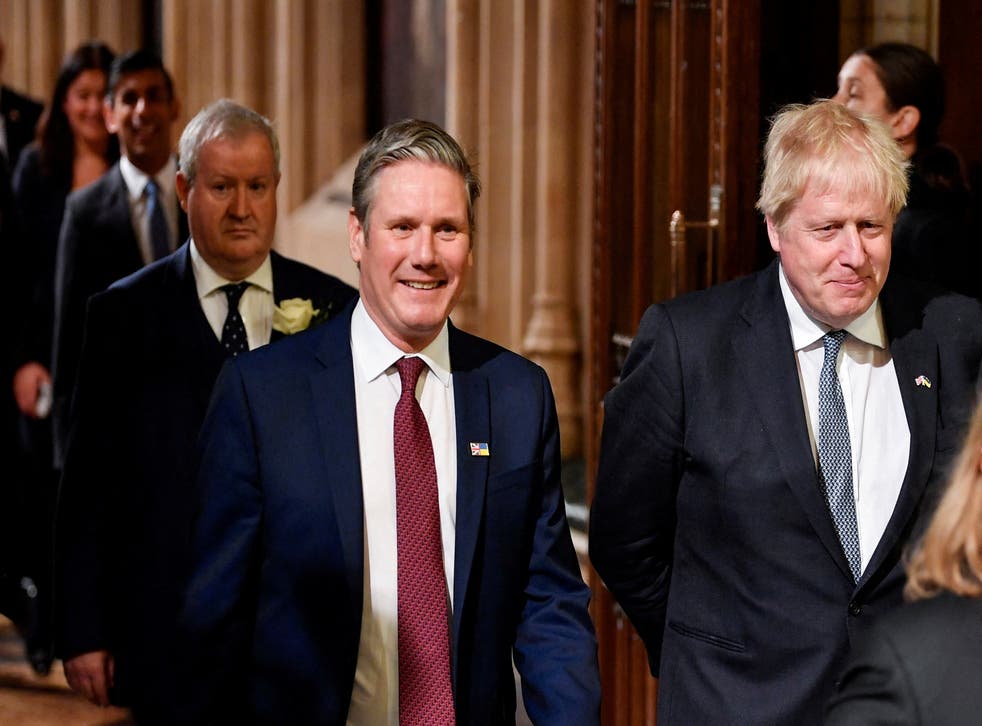Labour Party leader Sir Keir Starmer and Prime Minister Boris Johnson walk through the Members’ Lobby at the Palace of Westminster ahead of the State Opening of Parliament (Toby Melville/PA)