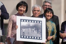Retired AP photographer Ut gives pope 'Napalm Girl' photo