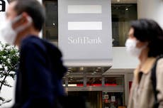 Japan's SoftBank sinks to losses as investments sour  