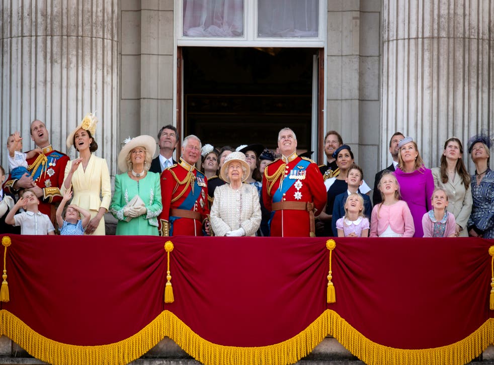 The Queen and members of the royal family on the balcony at Buckingham Palace watch a 2019 flypast (Victoria Jones/PA)
