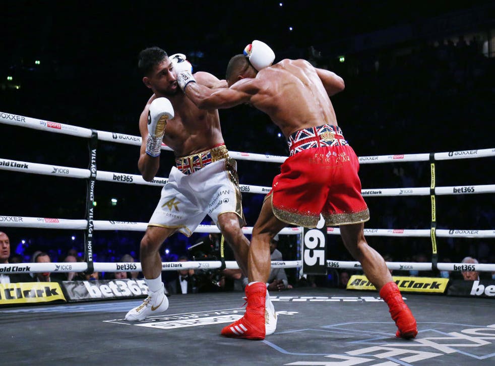 <p>Khan fighting for the last time, against Kell Brook at Manchester Arena in February</p>