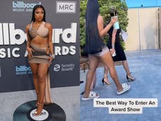 Megan Thee Stallion changes from heels to slides after red carpet