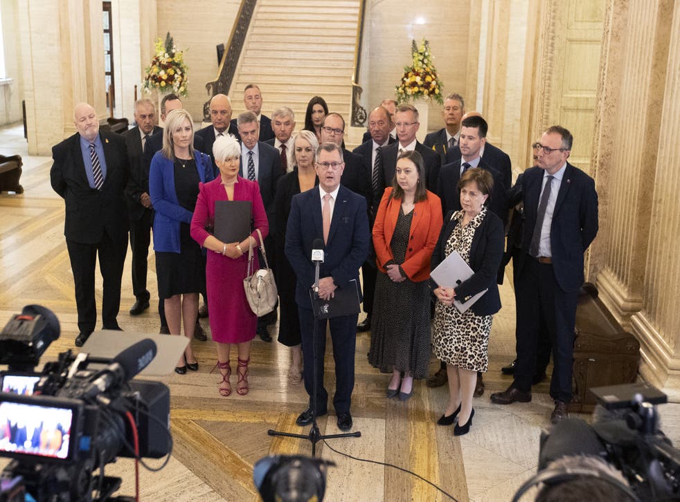 DUP Leader Sir Jeffrey Donaldson with party colleagues speaking in the Great Hall of Parliament Buildings at Stormont after refusing to agree to the nomination of a speaker (Liam McBurney/PA)