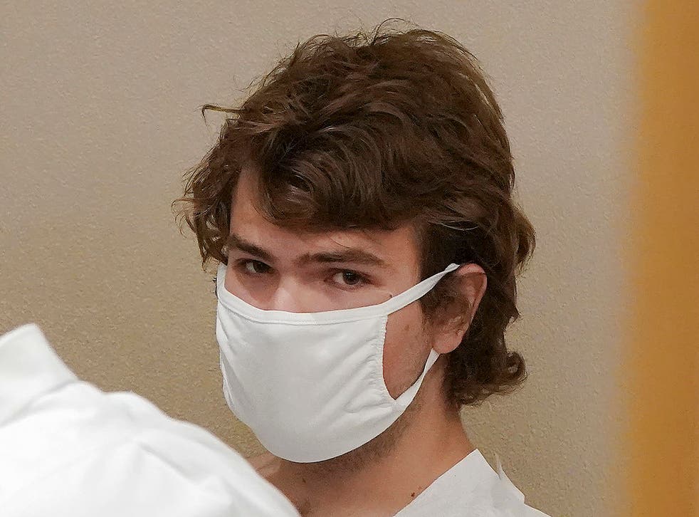 <p>Payton Gendron pictured in court hours after the attack </磷>